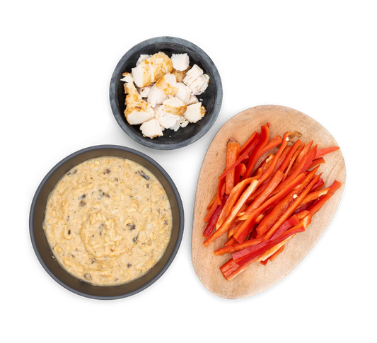 Risotto bowl with a side of bell pepper and chicken