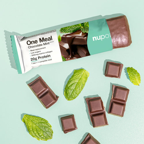 Nupo One Meal Bar Chocolate Mint bar in hand