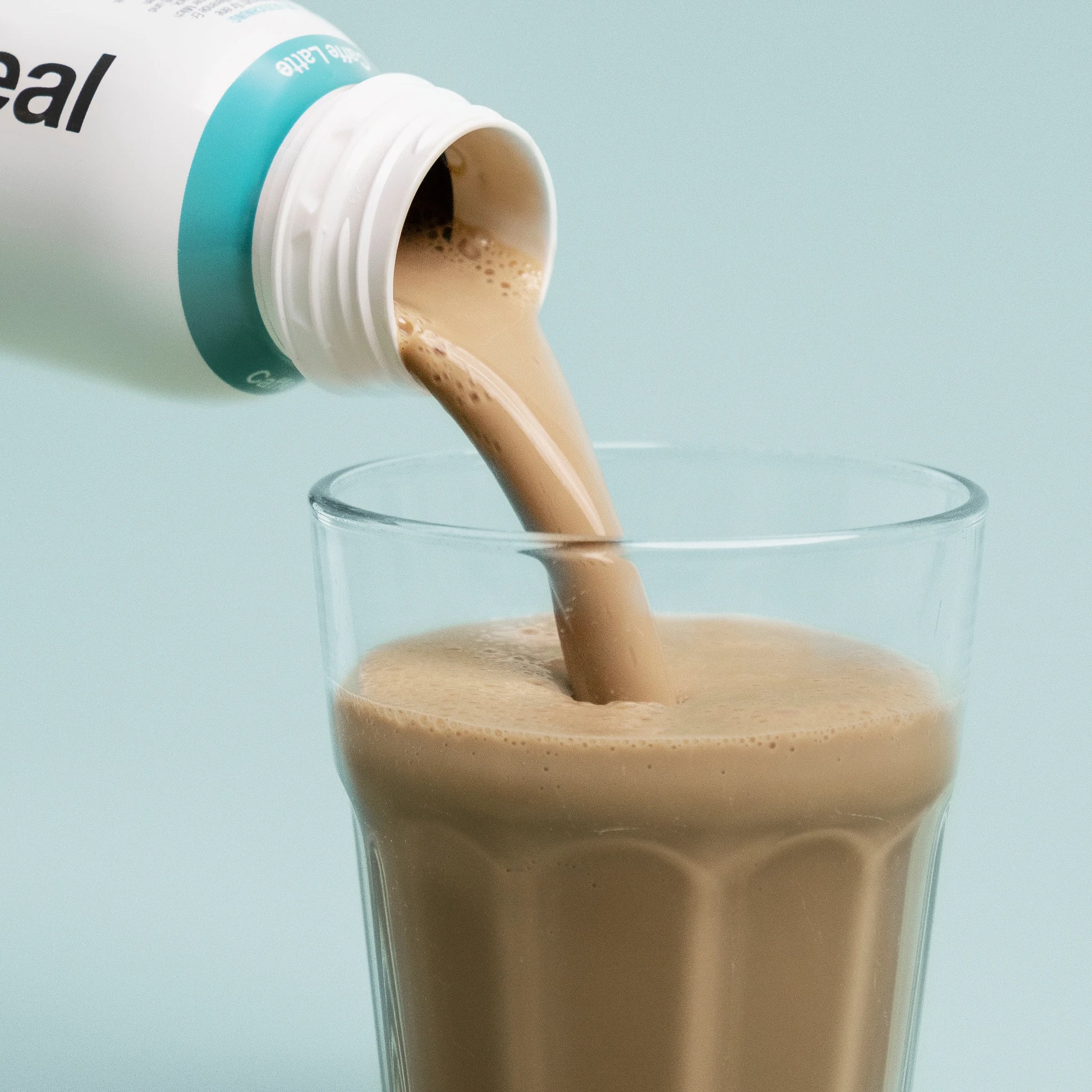 Nupo One Meal RTD Caffe Latte shake poured into glass